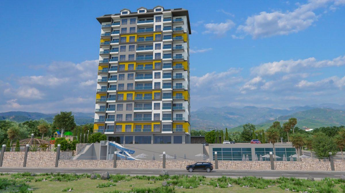 Высотный жилой комплекс в живописном районе Махмутлар 