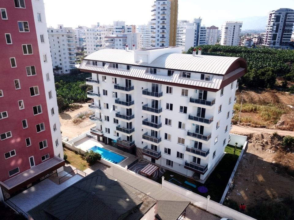 Апартаменты 1+1 в новом жилом комплексе в районе Махмутлар - Фото 1