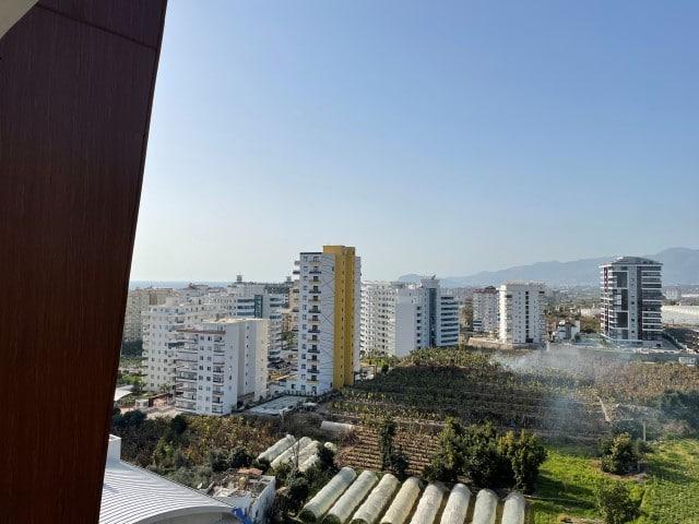 Квартира 1+1 с панорамным видом на горы в районе Махмутлар - Фото 16