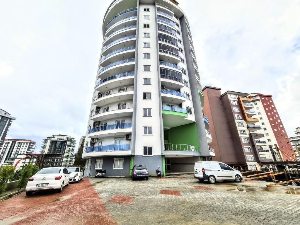 Квартира планировкой 2+1 на 8 этаже с уютным балконом в районе Махмутлар