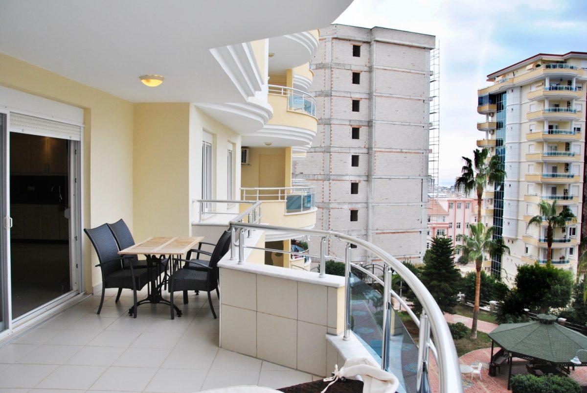 Трехкомнатные апартаменты с двумя застекленными балконами в районе Махмутлар - Фото 32