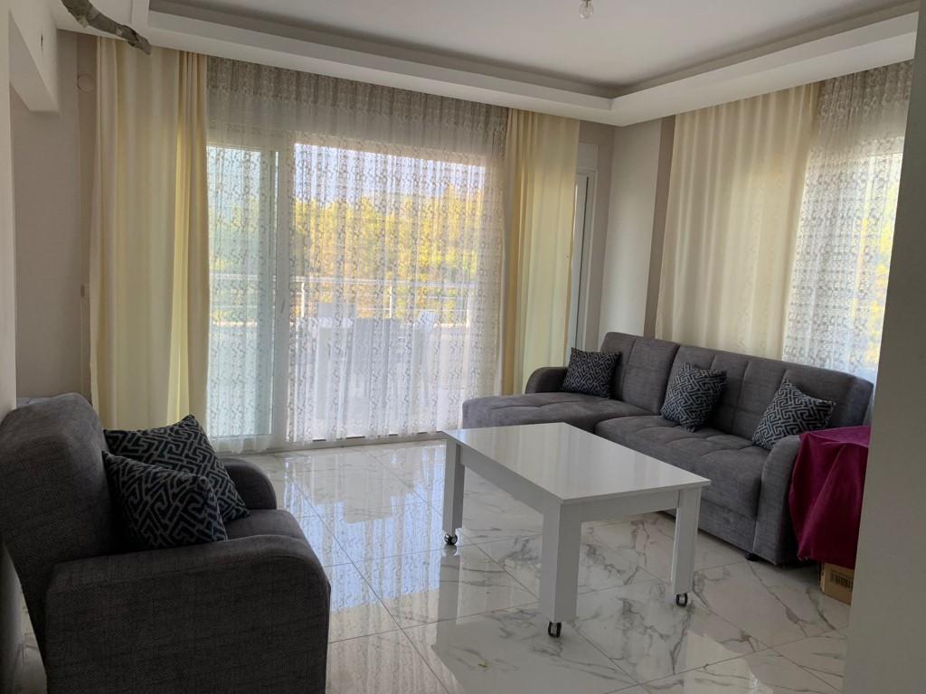 Квартира планировкой 1+1 с несколькими зонами отдыха в районе Оба 