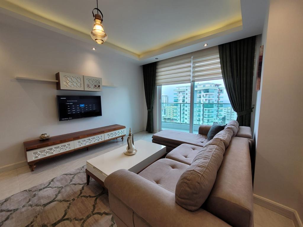 Двухкомнатная меблированная квартира в Алании 65 м² в районе Махмутлар 