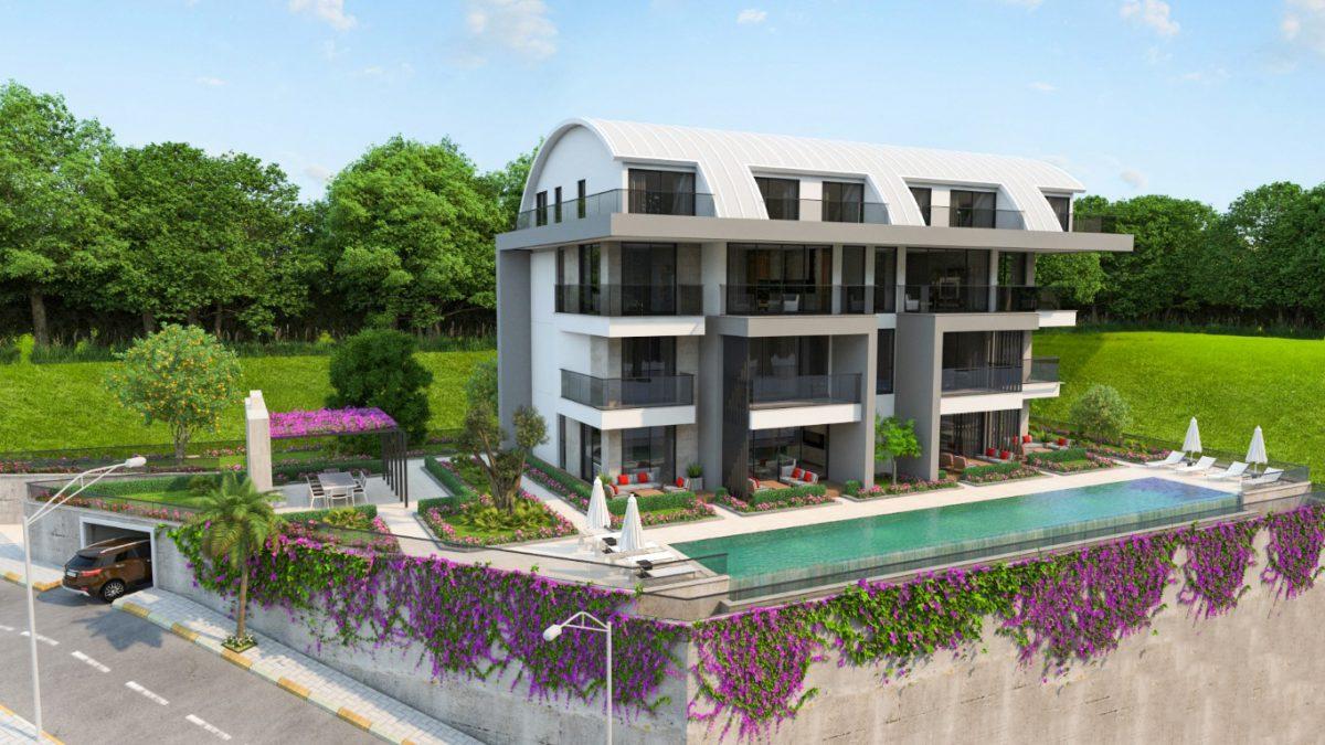 Новый проект с просторными апартаментами в центральном районе Алании с ВНЖ - Фото 1