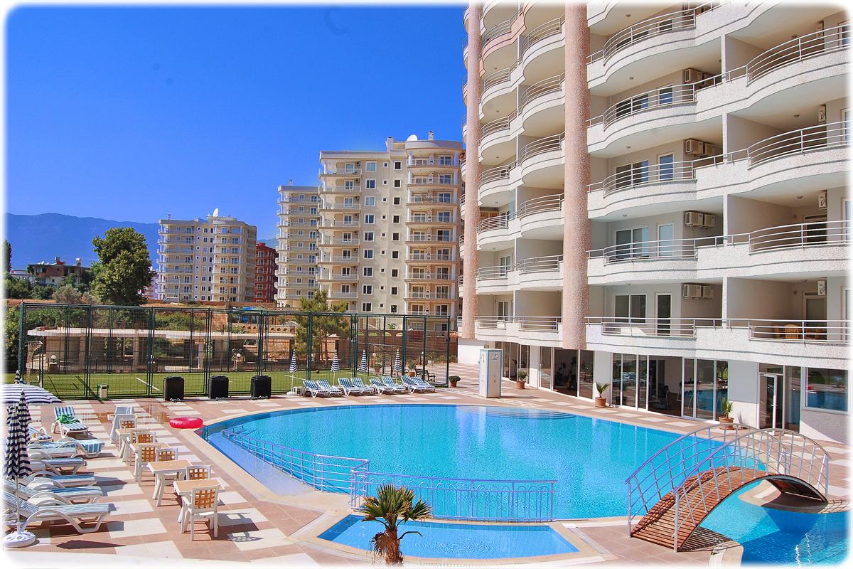 Трехкомнатные просторные апартаменты площадью 120 м2 в 550 метрах от моря в Тосмуре, Турция