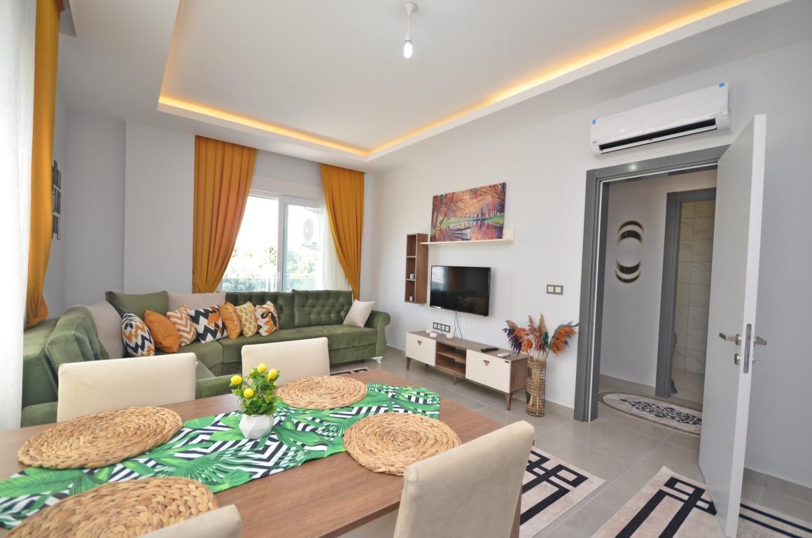 Меблированная квартира планировкой 1+1, площадью 55 м2, в Махмутларе, Турция - Фото 3