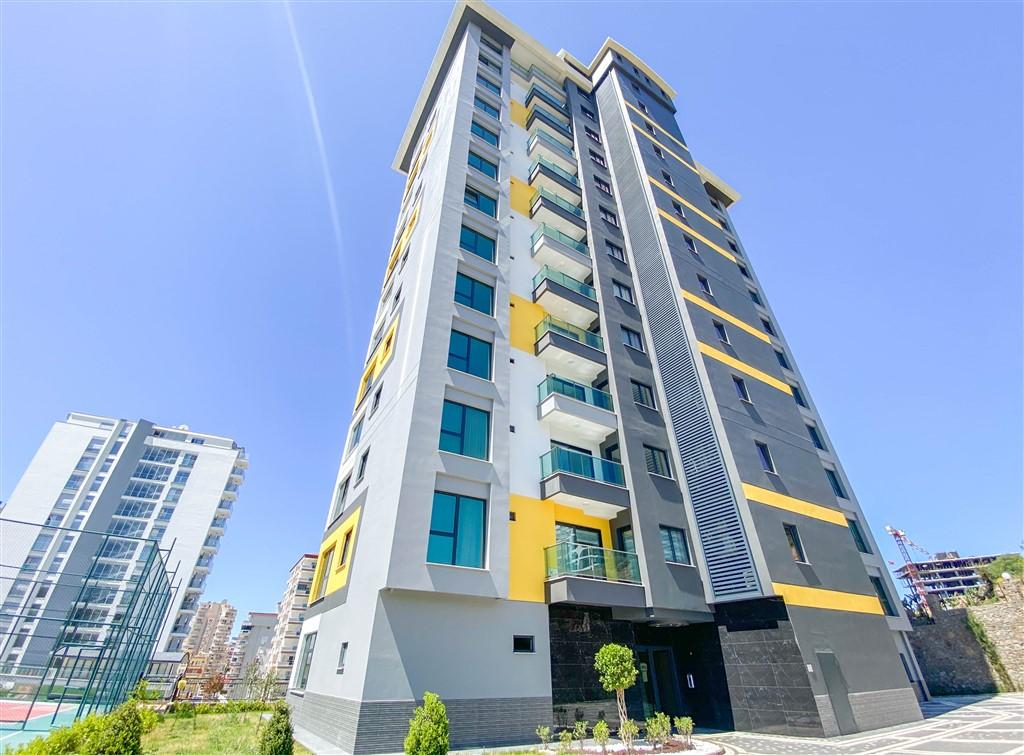 Двухкомнатные апартаменты площадью 49 м2 в новом ЖК района Махмутлар, Алания - Фото 6