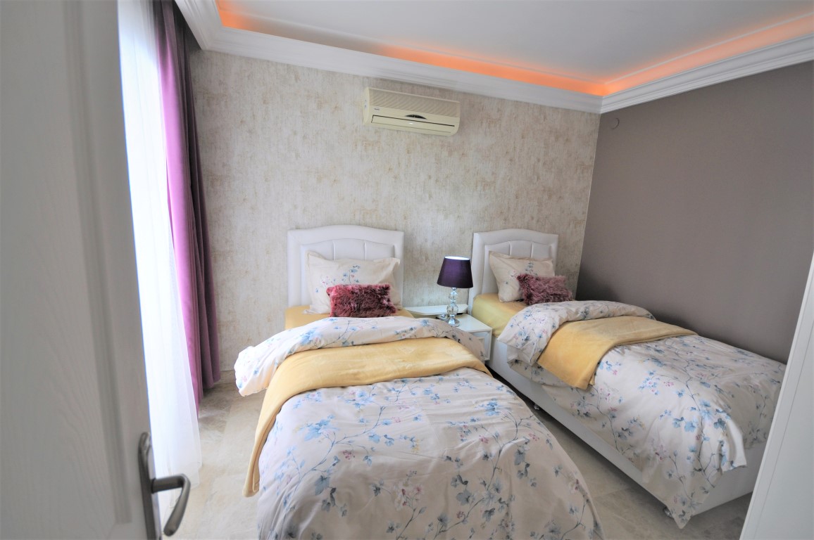 Дизайнерские меблированные апартаменты в Турции 2+1: квартира в Алании (Джикджилли) - Фото 24