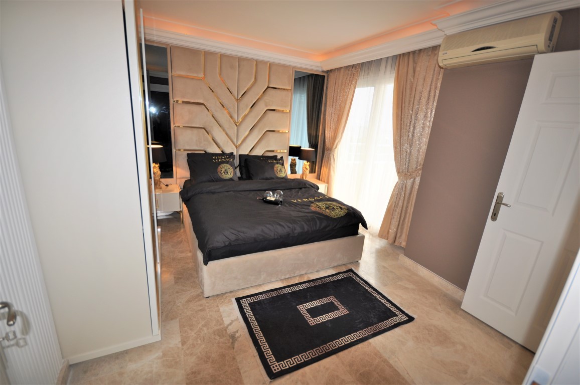 Дизайнерские меблированные апартаменты в Турции 2+1: квартира в Алании (Джикджилли) - Фото 27