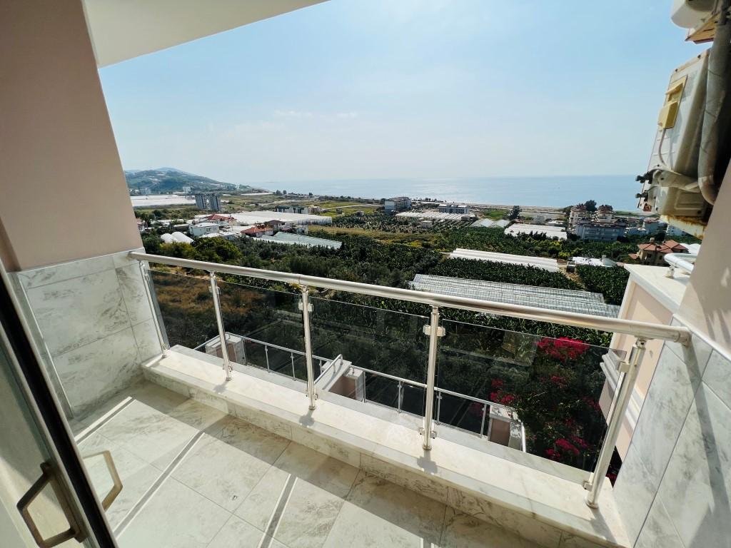 Меблированный пентхаус 4+1 с тремя террасами и видом на море в Демирташ Алания - Фото 11