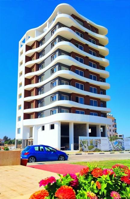 Новый современный проект на Северном Кипре, расположенный в районе Фамагуста, с апартаментами планировкой 2+1 - Фото 4
