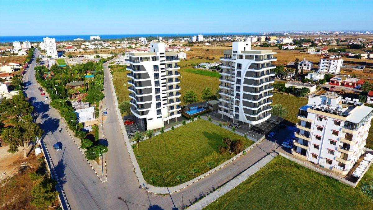 Новый современный проект на Северном Кипре, расположенный в районе Фамагуста, с апартаментами планировкой 2+1 - Фото 1
