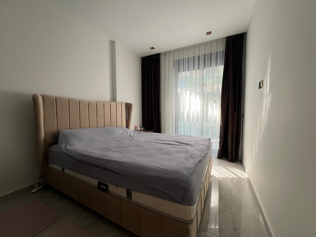 Двухкомнатная квартира 50 м² рядом с морем в центре Алании - Фото 37