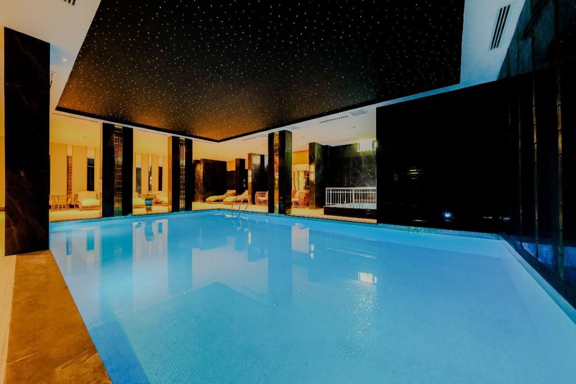 Двухкомнатная квартира 50 м² рядом с морем в центре Алании - Фото 13