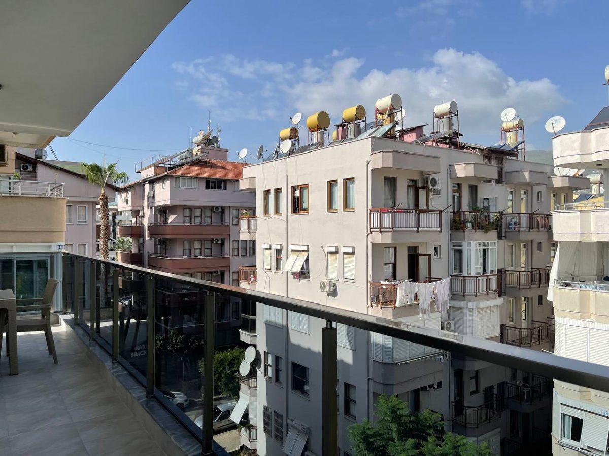 Двухкомнатная квартира с просторным балконом в центре Алании - Фото 12