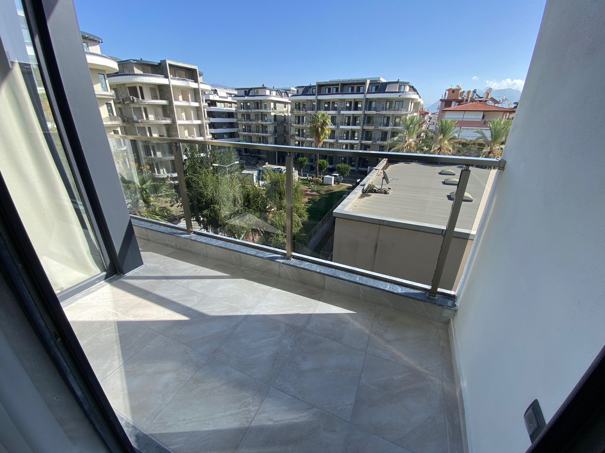 Двухкомнатная квартира с просторным балконом в центре Алании - Фото 14