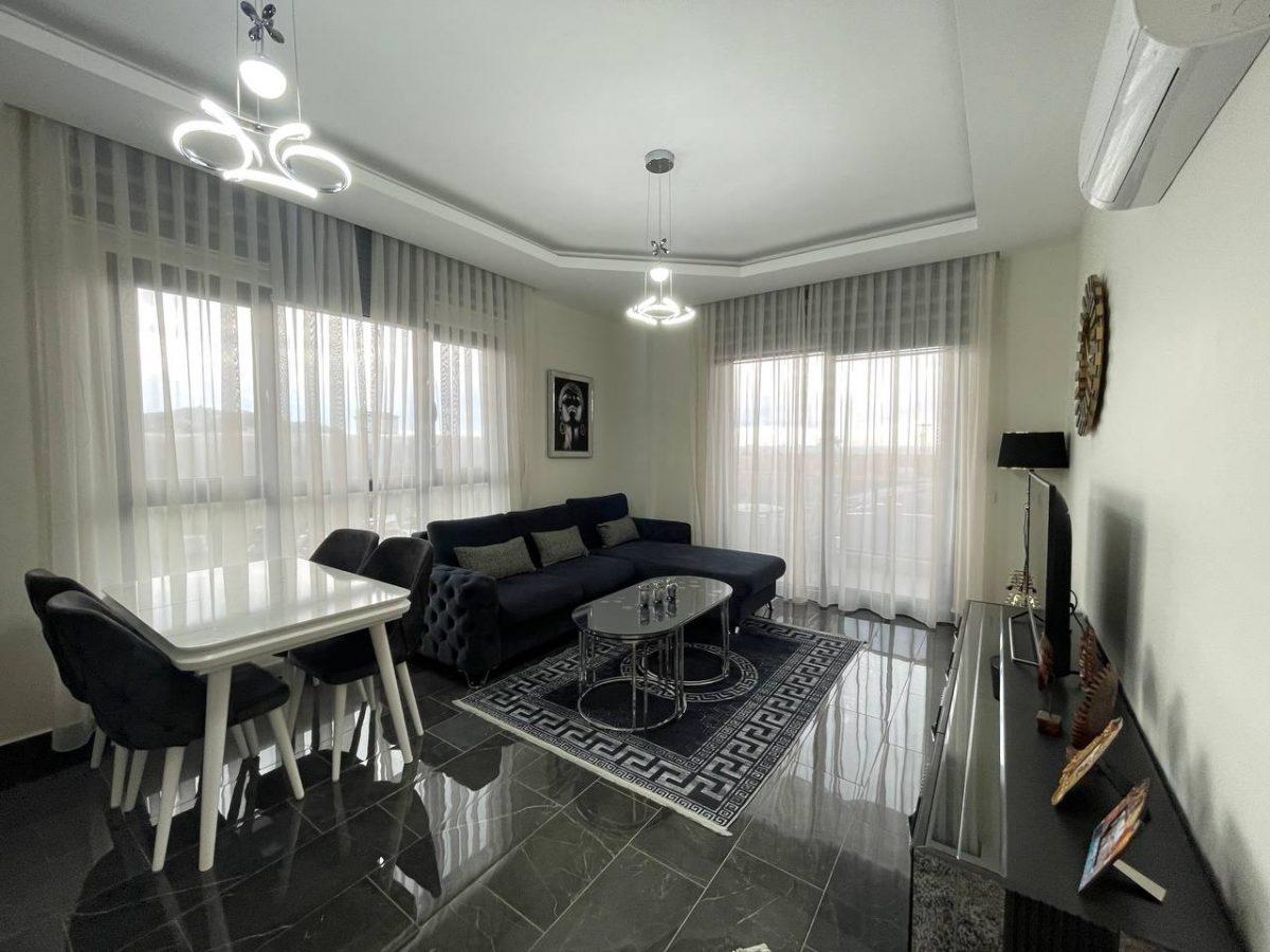 Двухкомнатная квартира в районе Демирташ, 400 м к пляжу - Фото 3