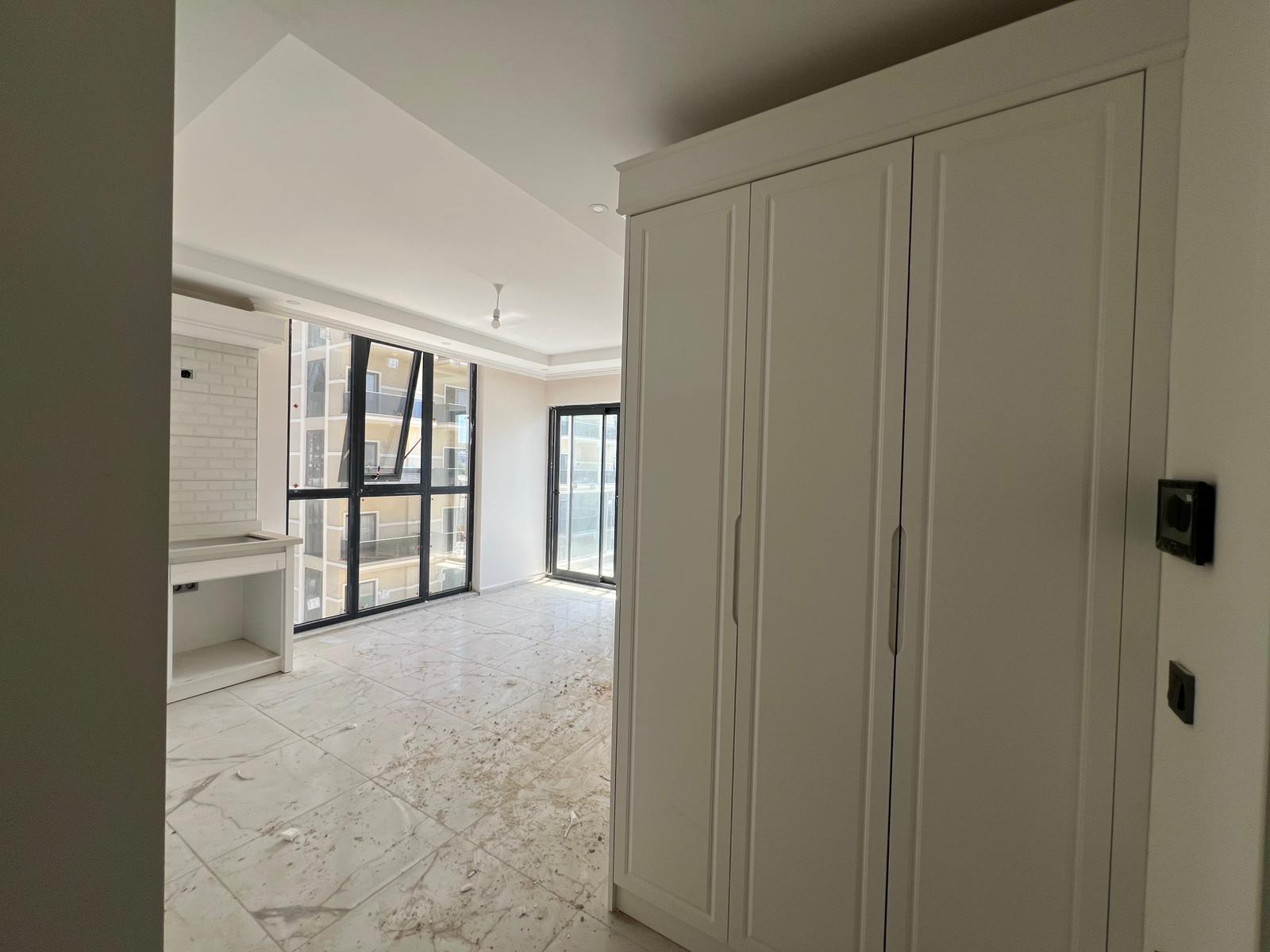 Двухкомнатная квартира 52 м² без мебели в районе Демирташ  - Фото 23