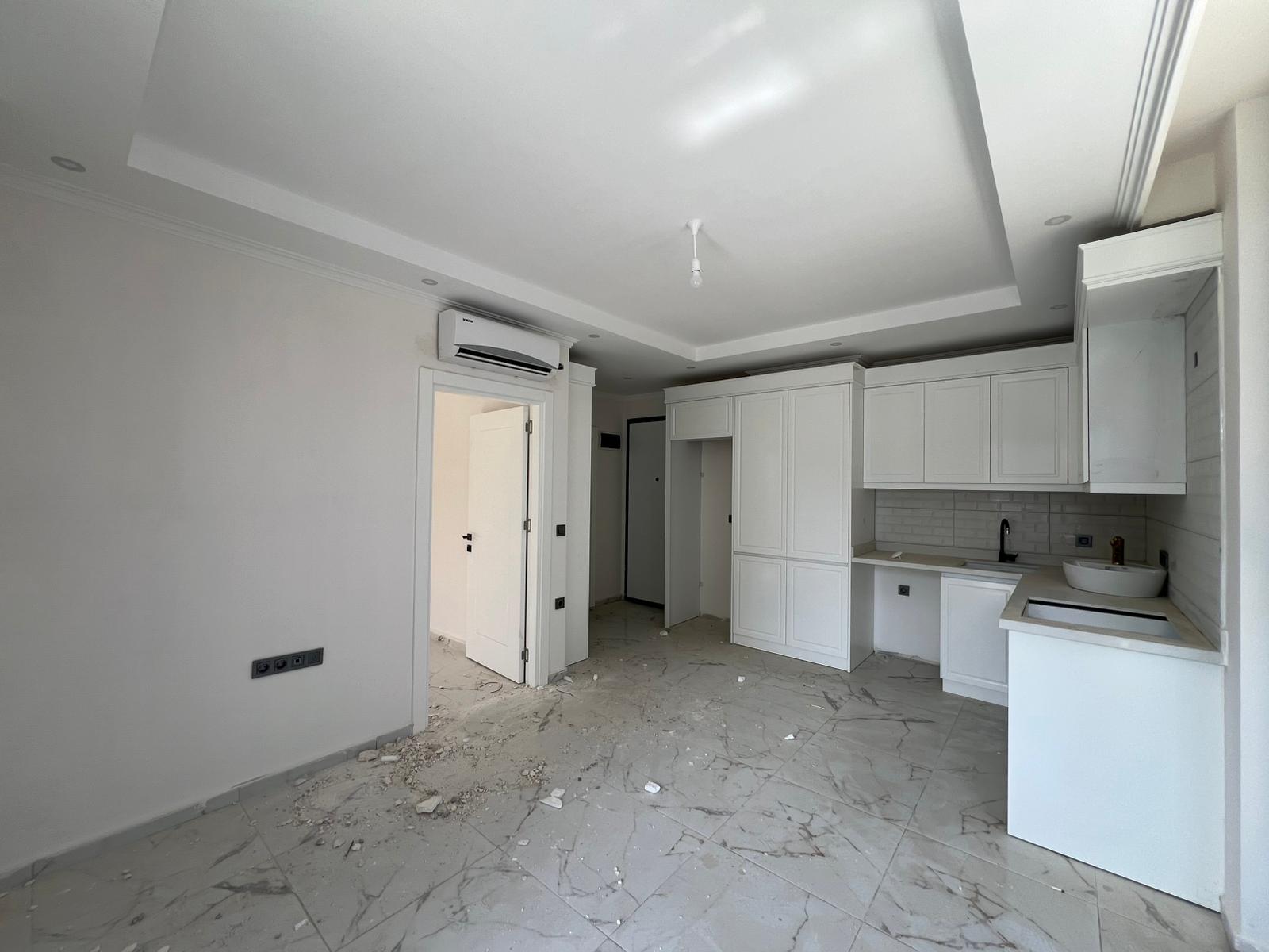 Двухкомнатная квартира 52 м² без мебели в районе Демирташ  - Фото 24