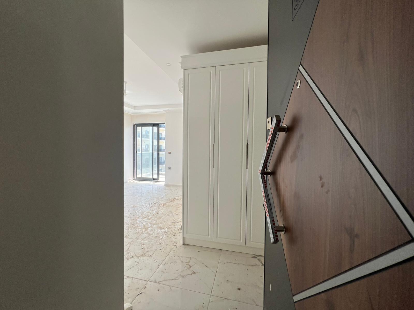 Двухкомнатная квартира 52 м² без мебели в районе Демирташ  - Фото 22