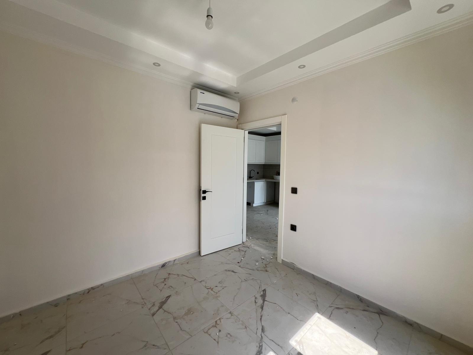 Двухкомнатная квартира 52 м² без мебели в районе Демирташ  - Фото 32