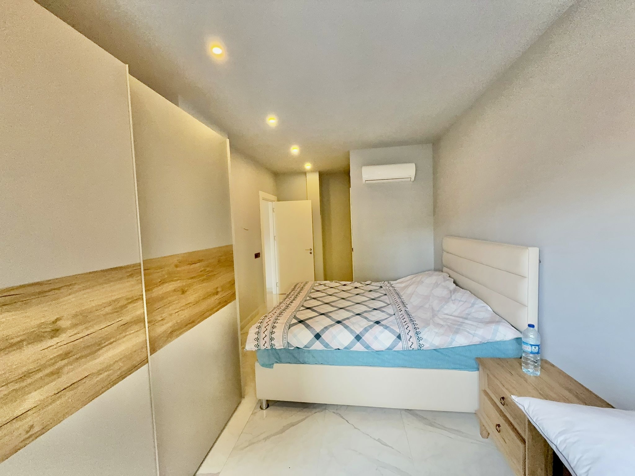 Квартира с планировкой 3+1 и отдельной кухней в центре Алании. - Фото 22