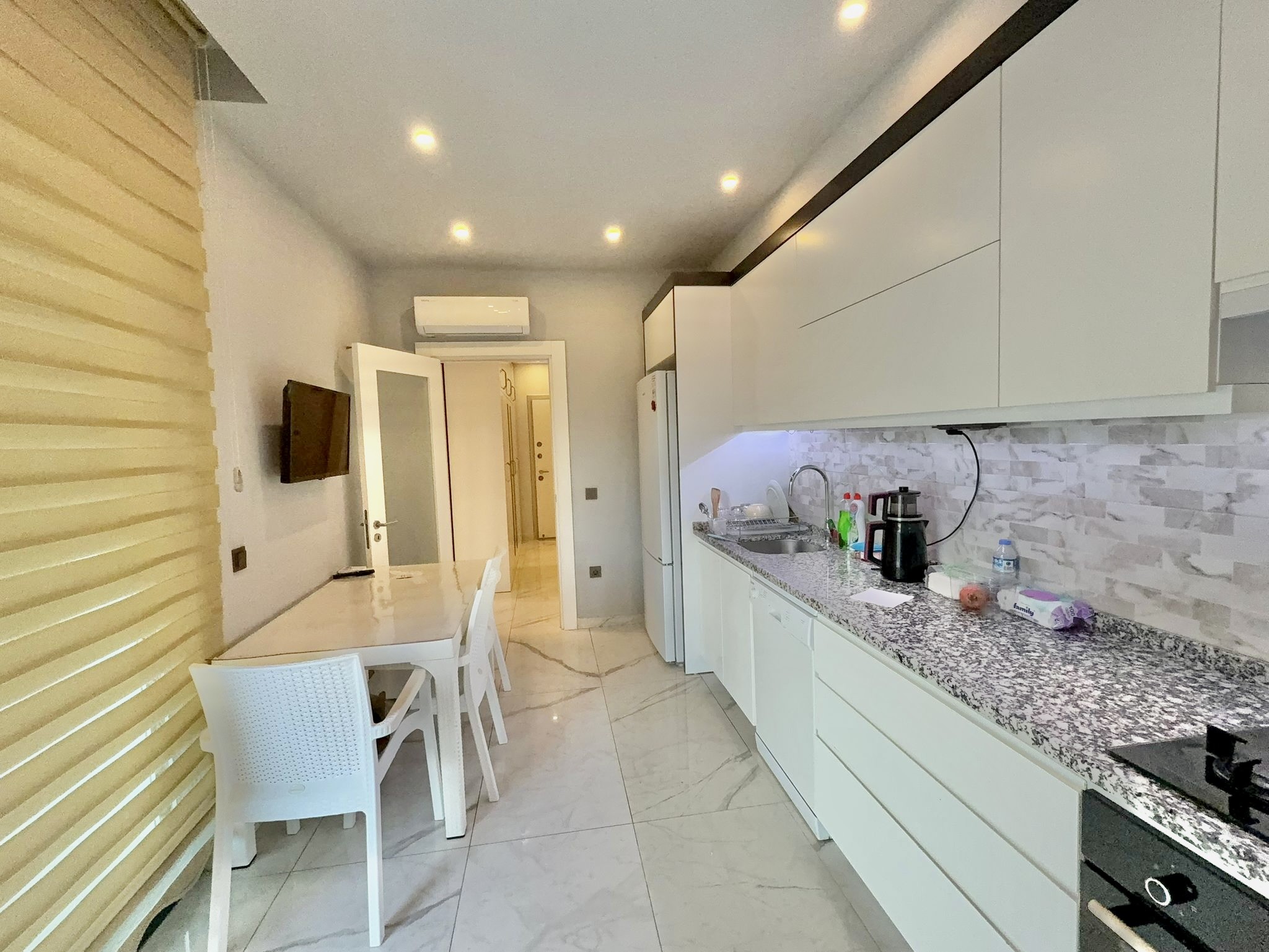 Квартира с планировкой 3+1 и отдельной кухней в центре Алании. - Фото 13