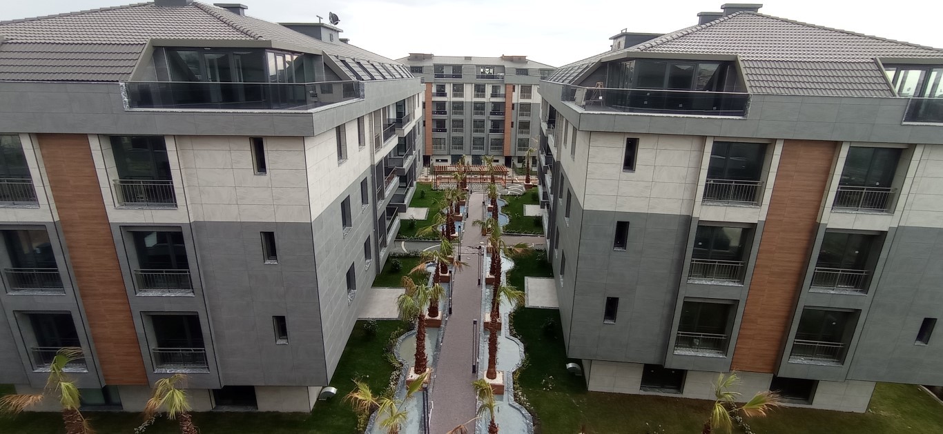 Современный жилой комплекс с разнообразными планировками в спокойном районе Бейликдюзю, Стамбул. - Фото 12