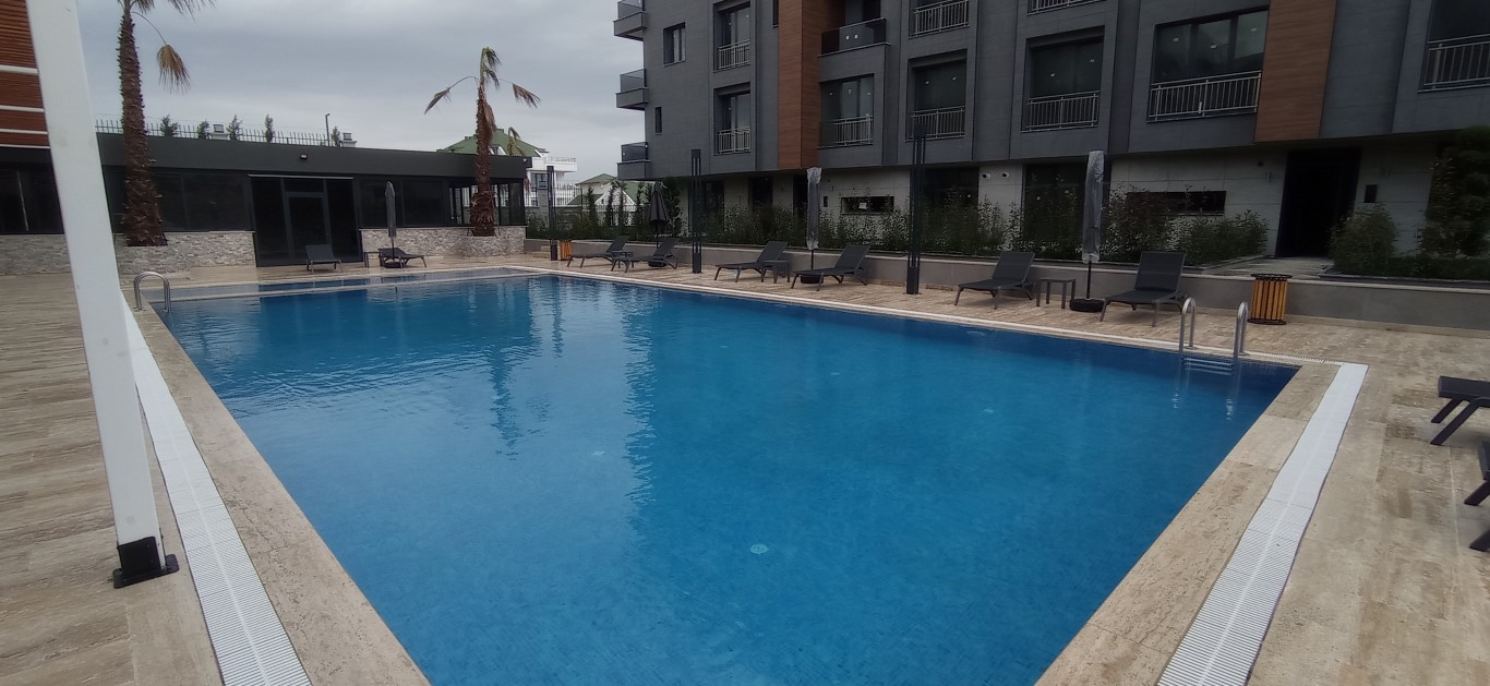 Современный жилой комплекс с разнообразными планировками в спокойном районе Бейликдюзю, Стамбул. - Фото 15