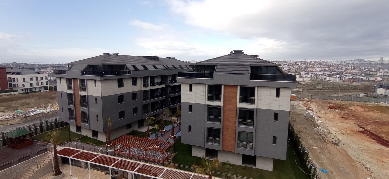 Современный жилой комплекс с разнообразными планировками в спокойном районе Бейликдюзю, Стамбул. - Фото 17