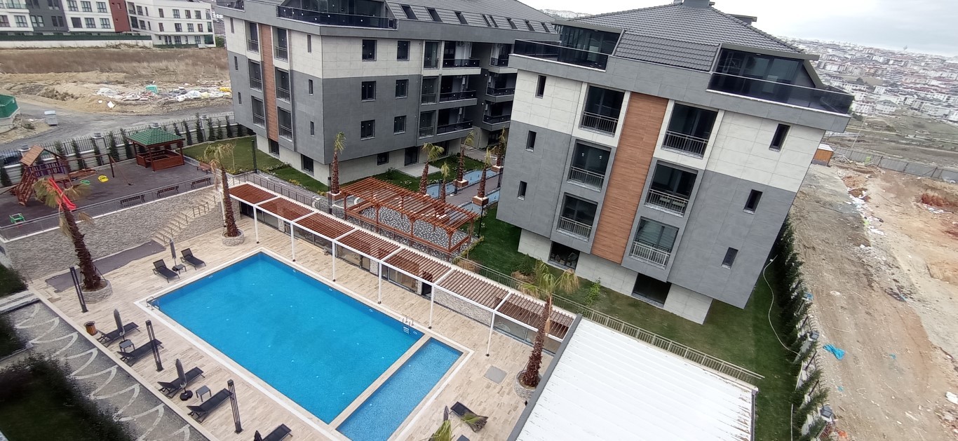 Современный жилой комплекс с разнообразными планировками в спокойном районе Бейликдюзю, Стамбул. - Фото 18