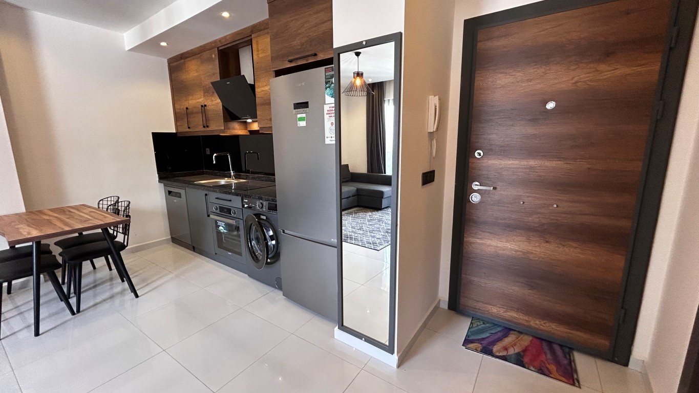 Меблированные апартаменты 1+1, 55 м² на 11 этаже в Махмутларе, в комплексе с развитой инфраструктурой. - Фото 18