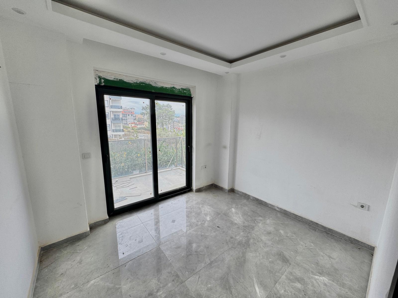 Квартира с планировкой 1+1, 42 м², в районе Авсаллар. - Фото 11