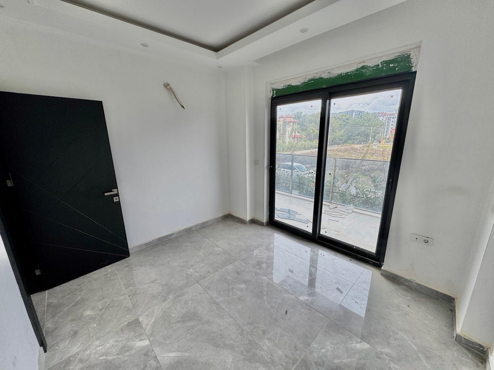 Квартира с планировкой 1+1, 42 м², в районе Авсаллар. - Фото 12