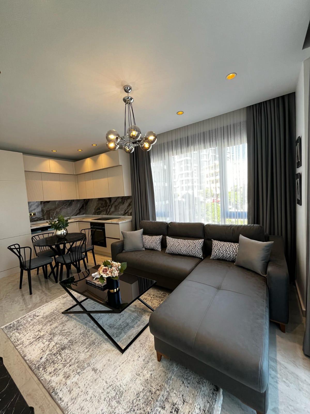 Апартаменты планировкой 1+1 рядом с морем в районе Тосмур. - Фото 44