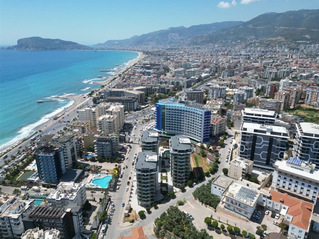 Апартаменты планировкой 1+1 рядом с морем в районе Тосмур. - Фото 3