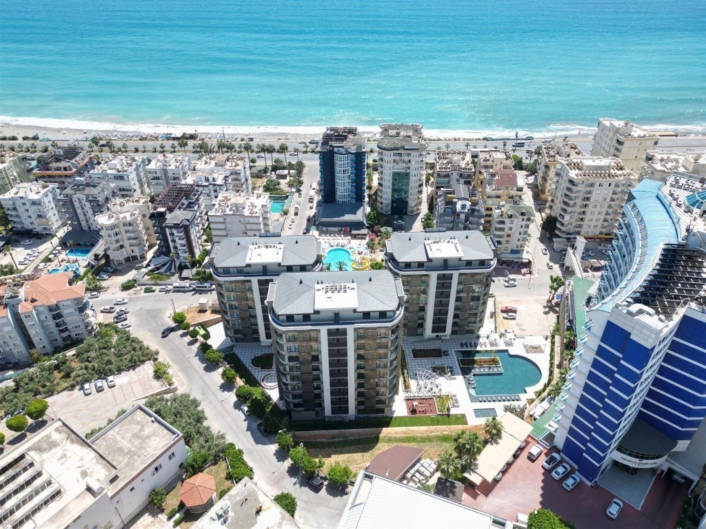 Апартаменты планировкой 1+1 рядом с морем в районе Тосмур. - Фото 2