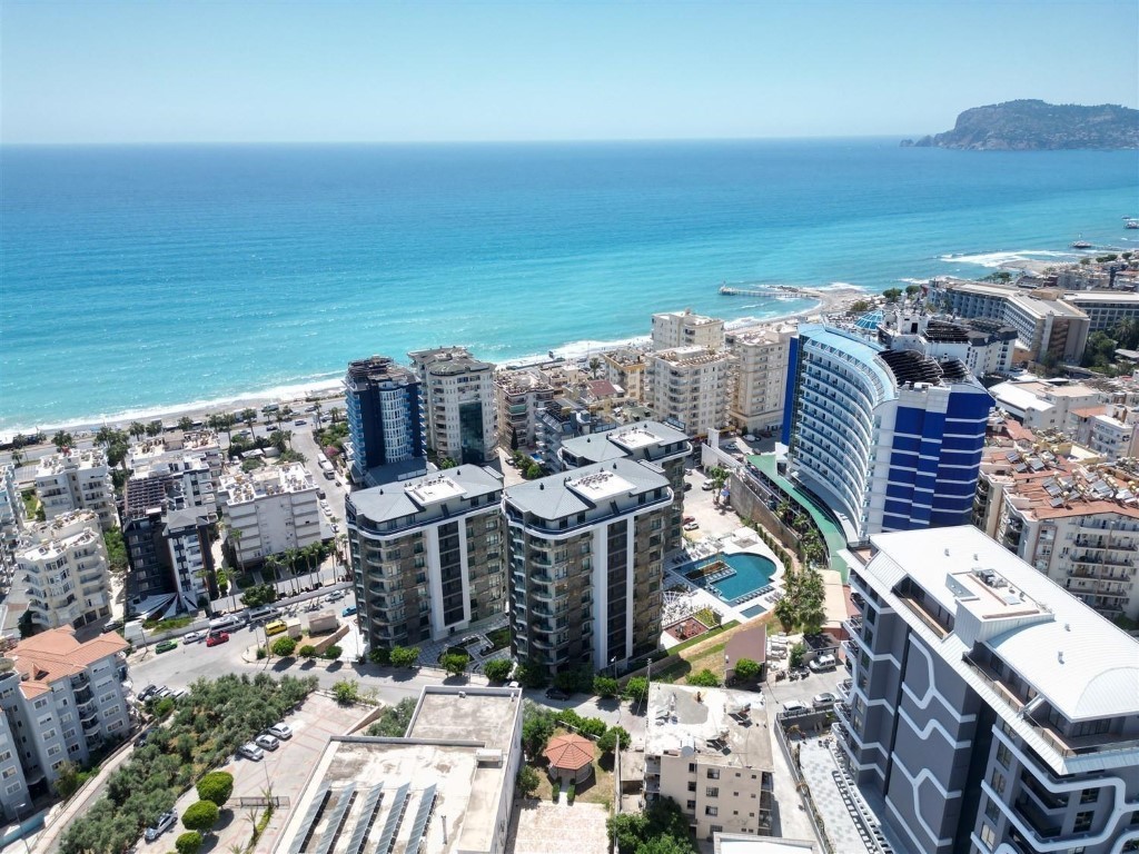 Апартаменты планировкой 1+1 рядом с морем в районе Тосмур.