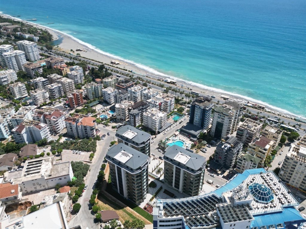 Апартаменты планировкой 1+1 рядом с морем в районе Тосмур. - Фото 4