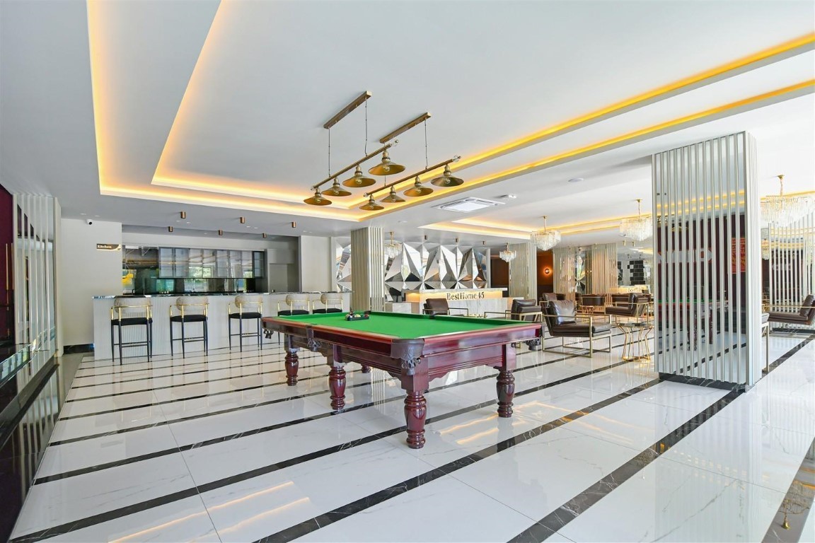 Апартаменты планировкой 1+1 рядом с морем в районе Тосмур. - Фото 20