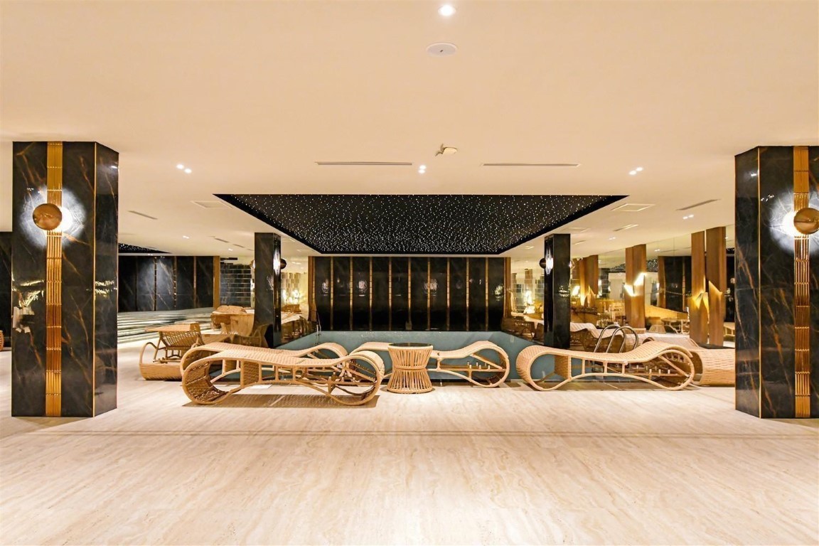 Апартаменты планировкой 1+1 рядом с морем в районе Тосмур. - Фото 21