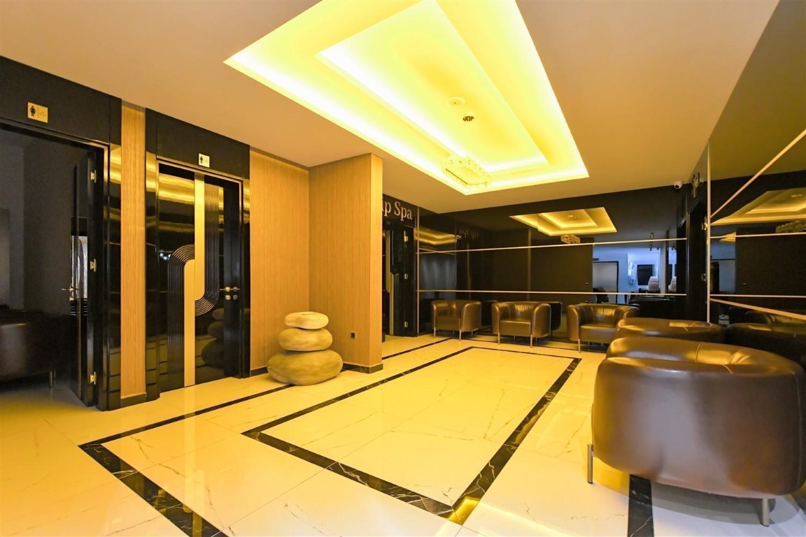 Апартаменты планировкой 1+1 рядом с морем в районе Тосмур. - Фото 34