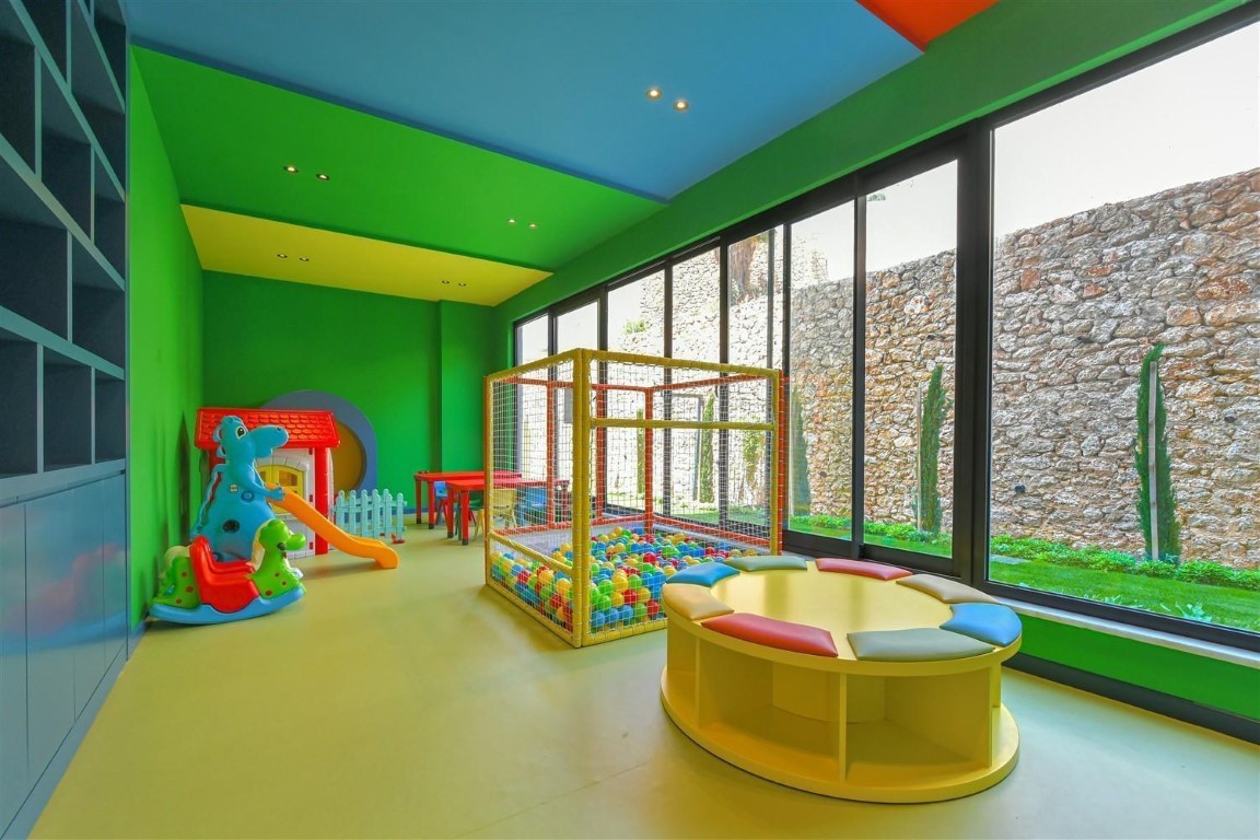 Апартаменты планировкой 1+1 рядом с морем в районе Тосмур. - Фото 37