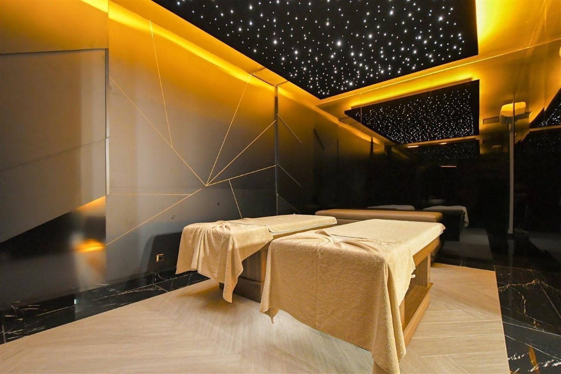 Апартаменты планировкой 1+1 рядом с морем в районе Тосмур. - Фото 32