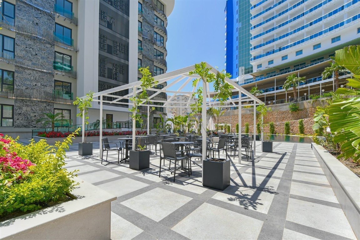 Апартаменты планировкой 1+1 рядом с морем в районе Тосмур. - Фото 14