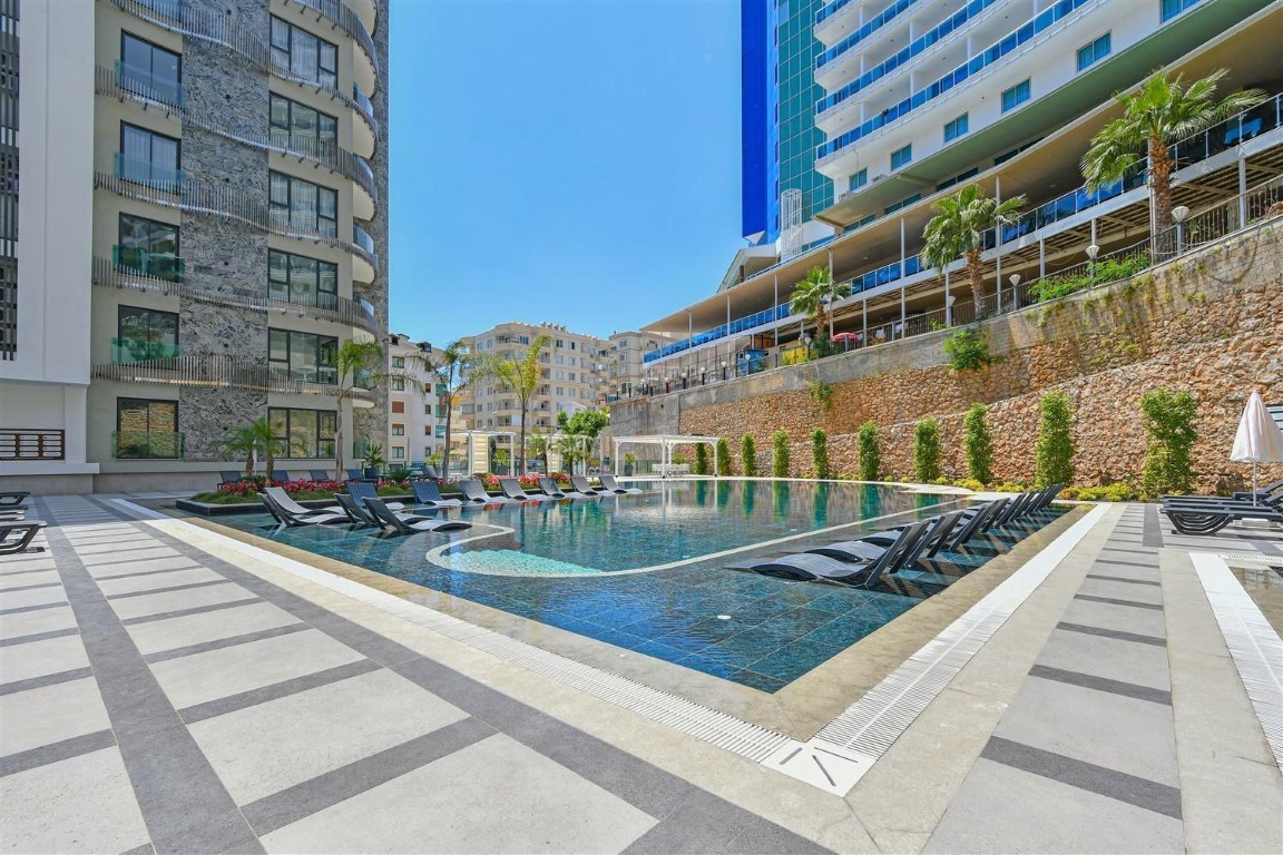 Апартаменты планировкой 1+1 рядом с морем в районе Тосмур. - Фото 13