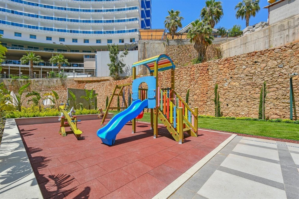 Апартаменты планировкой 1+1 рядом с морем в районе Тосмур. - Фото 22