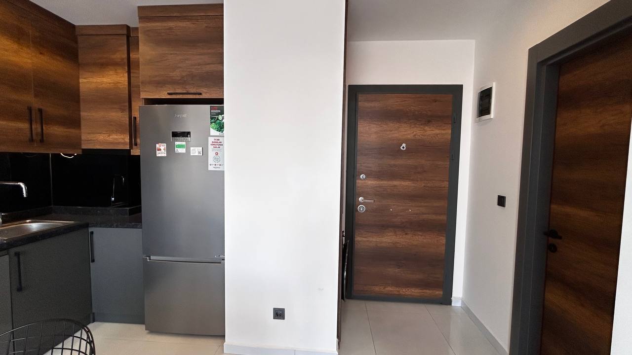 Меблированные апартаменты 1+1 в Махмутларе с видом на море, в комплексе с развитой инфраструктурой. - Фото 17