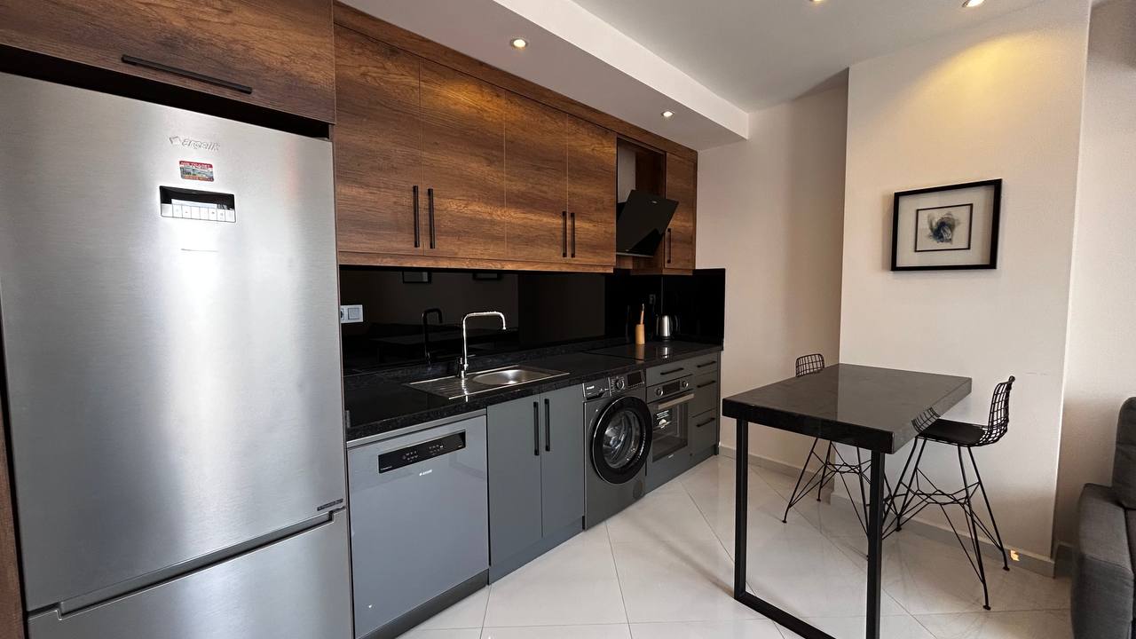 Меблированные апартаменты 1+1, 55 м² на 10 этаже в Махмутларе, в комплексе с развитой инфраструктурой. - Фото 20