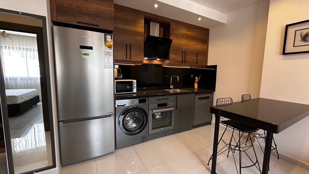 Меблированные апартаменты 1+1, 55 м² на 9 этаже в Махмутларе, в комплексе с развитой инфраструктурой. - Фото 21